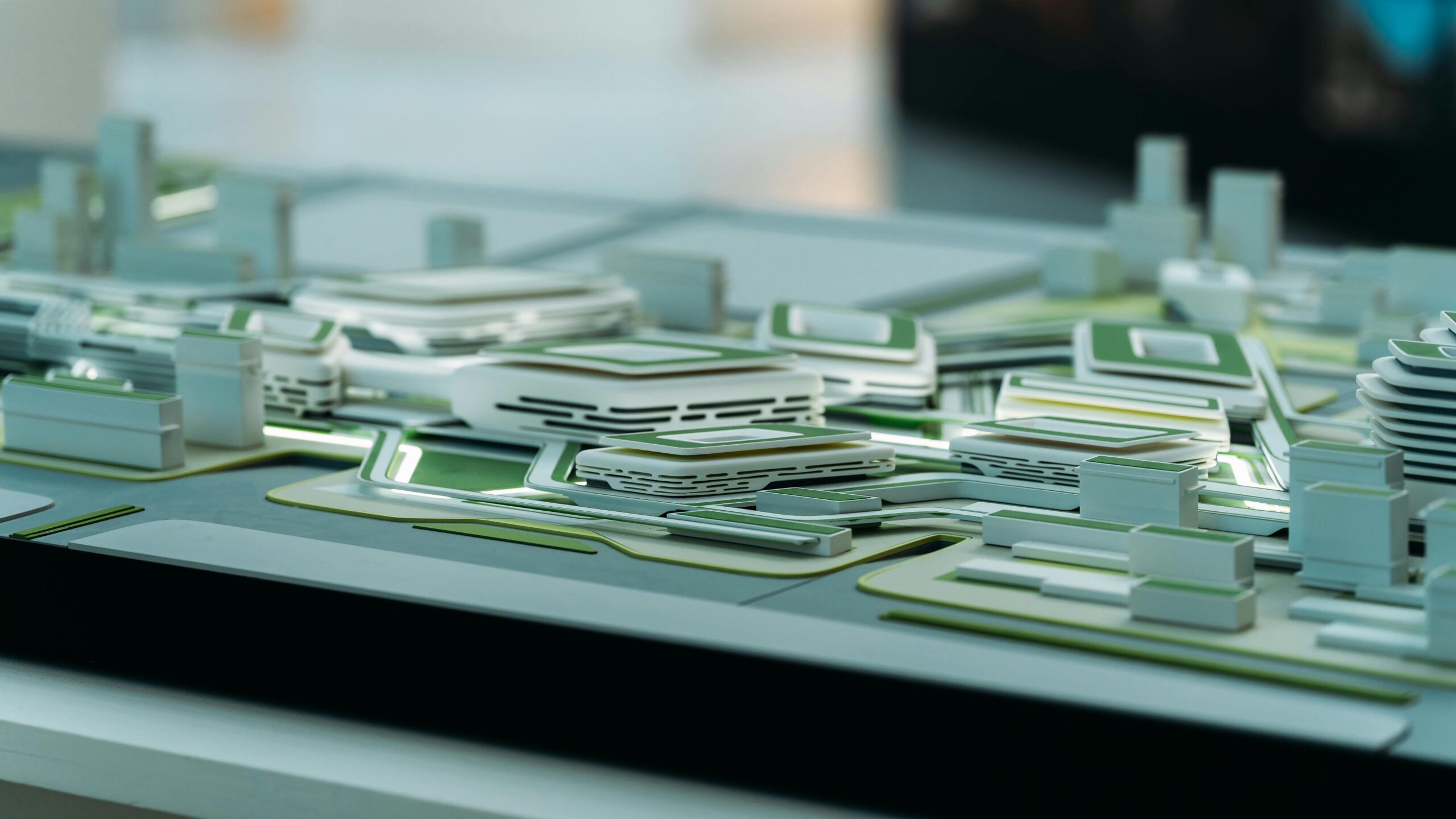 Close-up view of a futuristic architectural model showcasing urban design elements.